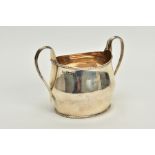 A DOUBLE HANDLED SILVER SUGAR POT, plain polished design, beaded edge, scroll handles, hallmarked