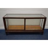 A LARGE EARLY 20TH CENTURY MAHOGANY SHOP DISPLAY CABINET, with double sliding doors, width 178cm x