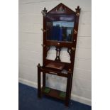 AN EARLY 20TH CENTURY MAHOGANY HALL STAND, with six brass hooks, central bevelled edge mirror, width