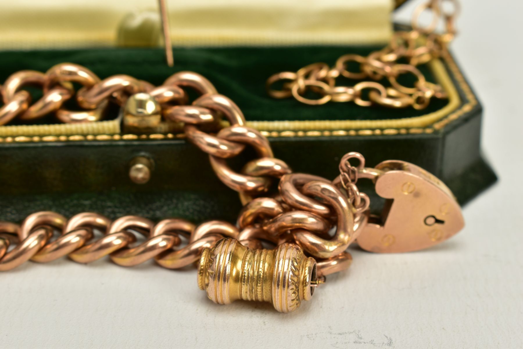 A 9CT GOLD CHARM BRACELET, A 9CT GOLD FINE BELCHER CHAIN AND A STICKPIN, an early 20th century charm - Image 2 of 3