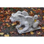 A COMPOSITE GARDEN FIGURE OF A MYTHICAL WINGED CREATURE, 65cm long and 46cm high