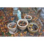 FIVE GLAZED GARDEN POTS and a green composite garden figure of a Medieval Lady 60cm high (6)