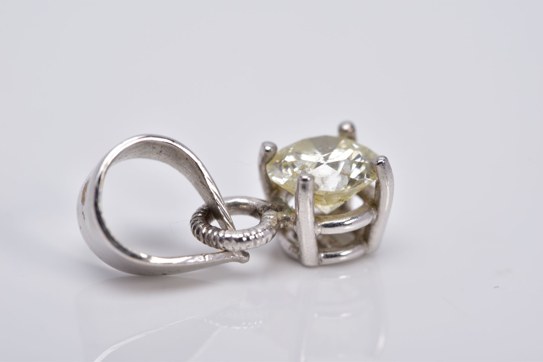 A SINGLE STONE DIAMOND PENDANT, the white metal pendant, designed with a claw set round brilliant - Image 3 of 3