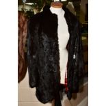A LADIES FRENCH RABBIT FUR COAT, bears size 16 tag to acetate lined interior, together with a