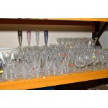 A COLLECTION OF CUT GLASS DRINKING GLASSES, including tall Waterford Crystal wine glasses, including