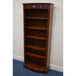 A MODERN SLIM MAHOGANY BOWFRONT OPEN BOOKCASE with five adjustable shelves, width 78cm x depth