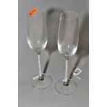 A PAIR OF SWAROVSKI CRYSTALLINE TOASTING FLUTES, Steven Weinberg design, height approximately