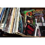 A TRAY CONTAINING FORTY SEVEN MOSTLY ROCK LPS, 12'' AND 7'' SINGLES, and audio cassette tapes