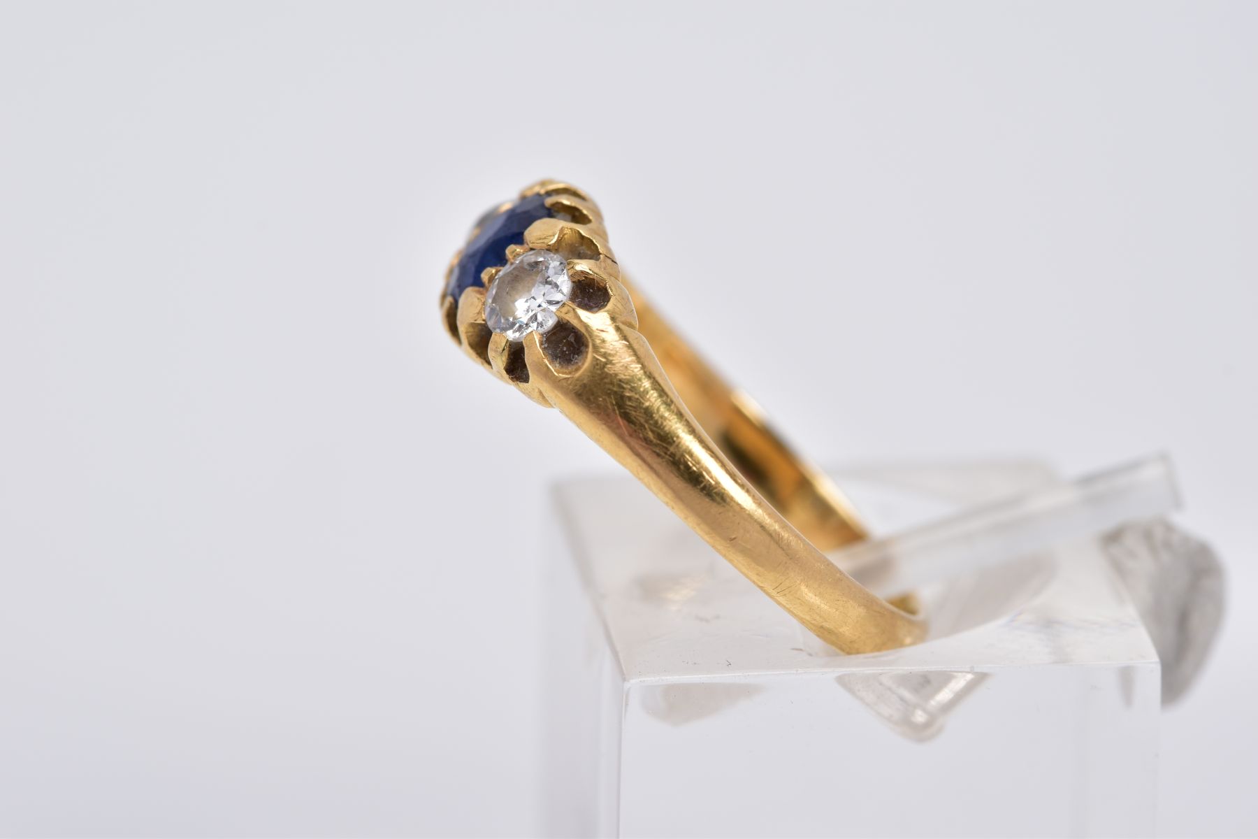 AN 18CT GOLD EARLY 20TH CENTURY SAPPHIRE AND DIAMOND RING, designed with a central oval cut blue - Image 2 of 3