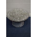 A DECORATIVE CIRCULAR COFFEE TABLE, made from a soft wood, with a glass top, diameter 74cm x