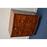 A VICTORIAN WALNUT AND MAHOGANY BOWFRONT CHEST OF TWO OVER THREE LONG GRADUATED DRAWERS, turned