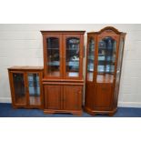 THREE VARIOUS MODERN CHERRYWOOD FINISH GLAZED DISPLAY CABINETS, to include a glazed two door