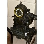 A LATE 19TH CENTURY BRONZED METAL MANTEL CLOCK, the ornate case modelled as an Indian elephant