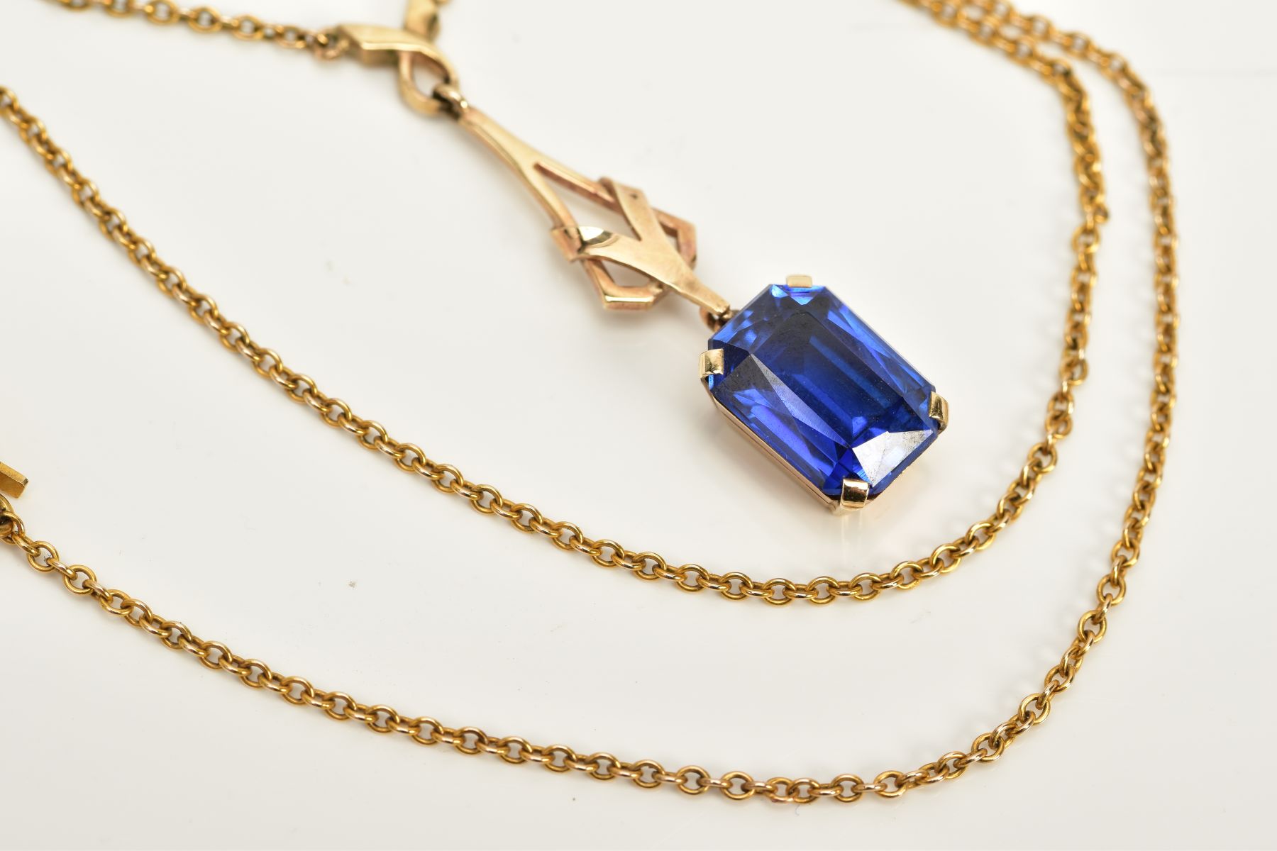 A YELLOW METAL SAPPHIRE PENDANT NECKLACE, designed with an openwork drop detailed pendant with a - Image 3 of 3