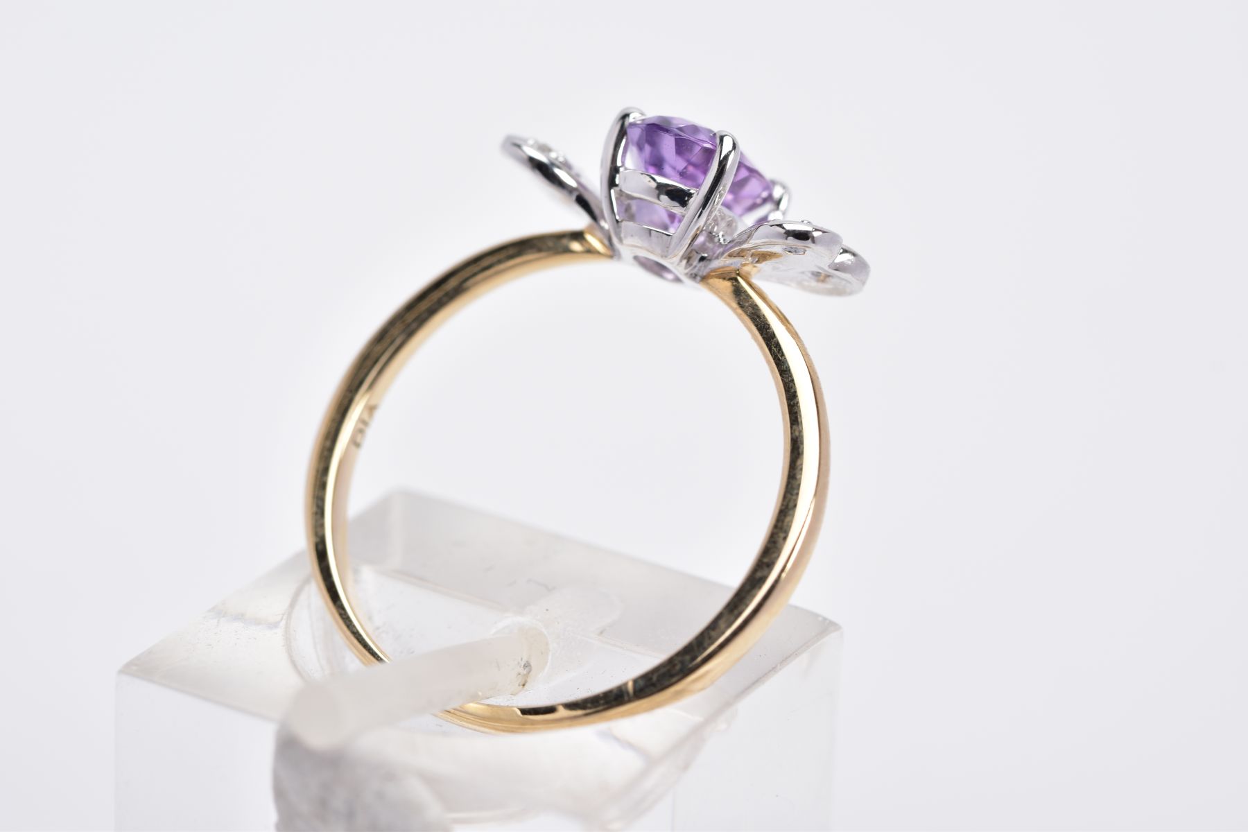 A 9CT GOLD AMETHYST AND DIAMOND RING, designed with a claw set, oval cut amethyst, with heart shaped - Image 3 of 3