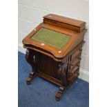 A REPRODUCTION MAHOGANY DAVENPORT, with green leather top, and eight drawers, width 55cm x depth