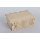 A CARVED IVORY BOX, the rectangular hinged box, with an engraved floral design to the front panel,