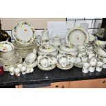 A ROYAL DOULTON 'LARCHMONT' DINNER SERVICE to include tureens, tea and coffee pots, twin handled