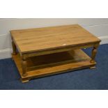 A REPRODUCTION SOLID OAK COFFEE TABLE, on turned supports width 111cm x depth 65cm x height 45cm