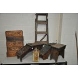 A VINTAGE MAHOGANY SHOE SHINE STOOL, together with another shoe shine stool, an oak stool, a