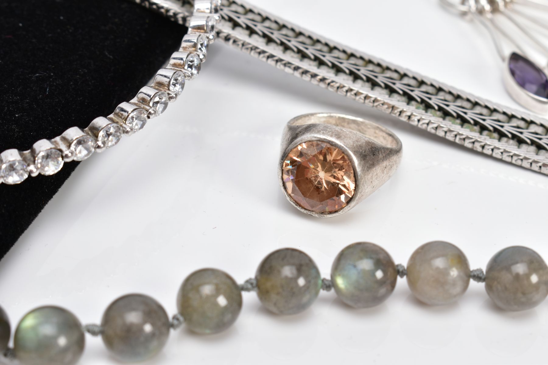 A SELECTION OF JEWELLERY, to include a white metal multi drop pendant, set with seven marquise cut - Image 4 of 4