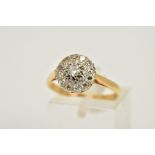 AN 18CT GOLD DIAMOND CLUSTER RING, the tiered cluster set with a central round brilliant cut