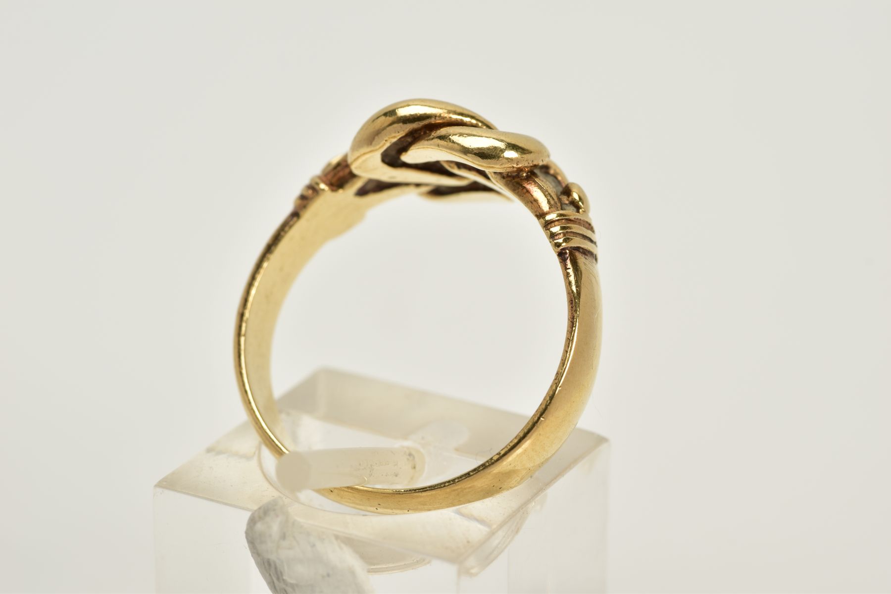 A 9CT GOLD KNOT RING, with a plain polished wide band, hallmarked 9ct gold London, ring size O, - Image 3 of 3