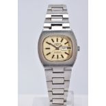 A GENTS AUTOMATIC LANCO STAINLESS STEEL WRISTWATCH, designed with a gold coloured dial, dial