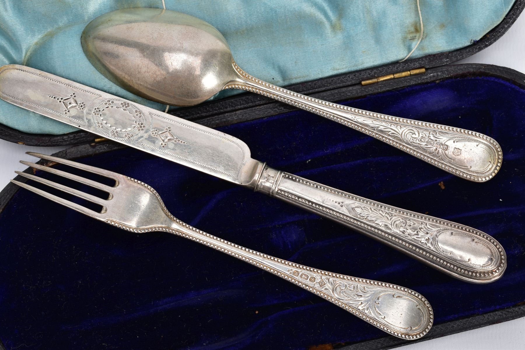 A CASED SET OF SILVER CUTLERY, to include a three-piece set of floral engraved beaded edge pattern - Image 3 of 3