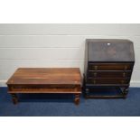 A MID 20TH CENTURY OAK BUREAU, together with a hardwood coffee table (2)