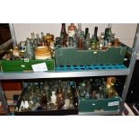 FOUR BOXES OF VINTAGE GLASS BOTTLES, stoneware jars, miniature Bells Whisky decanters, ship in a
