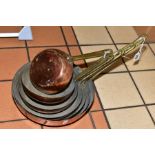 A SET OF SEVEN GRADUATING COPPER FRYING PANS, with brass handles, smallest diameter 14.5cm,