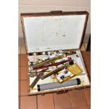 A WOODEN ARTISTS BOX AND CONTENTS to include brushes and paints etc, approximate dimensions width
