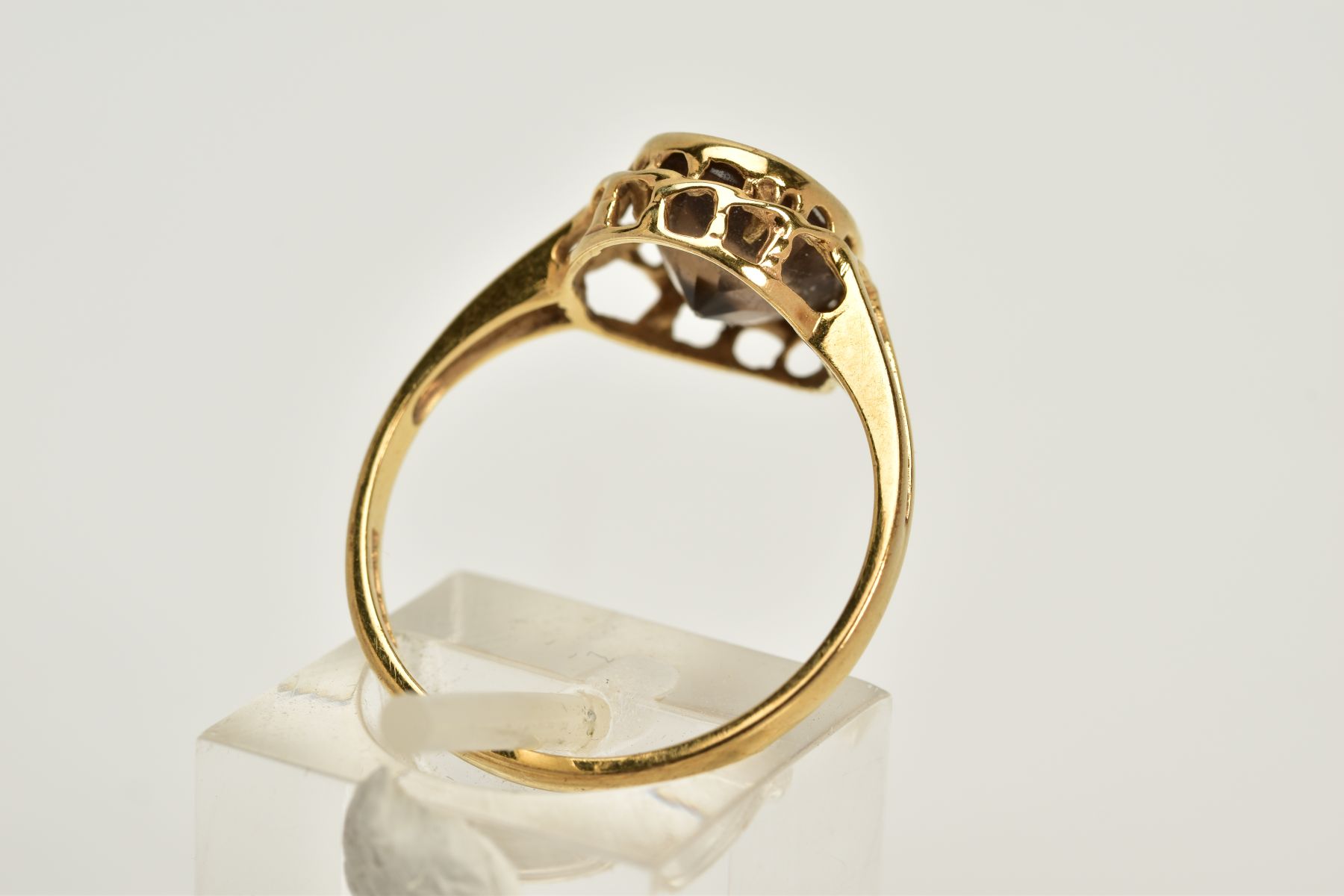 A 9CT GOLD SMOKEY QUARTZ RING, designed with an oval cut smokey quartz within a collet mount, - Image 3 of 3