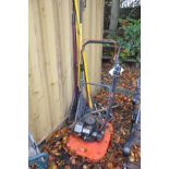 A VINTAGE FLYMO PETROL LAWN MOWER, with a Suzuki M120X engine (engine pulls freely, but has not been