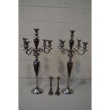 A PAIR OF ALUMINIUM FIVE BRANCH CANDLEABRA'S, height 88cm together with a pair of silver plated