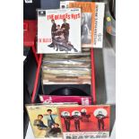 A SINGLES CASE CONTAINING OVER EIGHTY SINGLES AND EPS BY THE BEATLES AND ATTRIBUTING ARTISTS