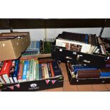 SEVEN BOXES OF BOOKS, including Readers Digest novels, Heron books, Charles Dickens series,