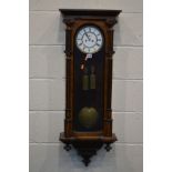 A LATE 19TH/EARLY 20TH CENTURY WALNUT VIENNA WALL CLOCK, height 106cm (two weights, pendulum and