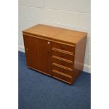A HORN NAH-COLLECTION 1980'S TEAK SEWING CABINET, with a fold over top, single door, various storage