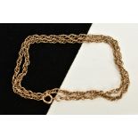 A YELLOW METAL CHAIN, Prince of Wales chain fitted with a spring clasp, length 520mm, approximate