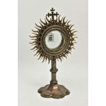 A LATE 19TH/EARLY 20TH CENTURY ECCLESIASTICAL SILVER PLATED AND GILT METAL MONSTRANCE, radiating