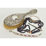 A SELECTION OF ITEMS, to include a silver foliate embossed hair brush, hallmarked Chester 1906, a