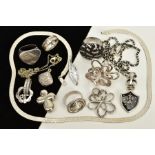 A SELECTION OF WHITE METAL JEWELLERY, to include a flat articulated chain fitted with a lobster claw