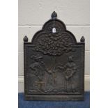 A CAST IRON FIRE BACK, depicting the tree of life, width 51cm x height 74cm