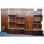 POUL CADOVIUS FOR CADO, a 1970's Danish rosewood five section modular wall panelled shelving system,