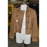 AN ITALIAN LEATHER LADIES LIGHT BROWN JACKET by O.B.E. Bespoke leather specialists, having feature