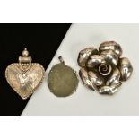TWO WHITE METAL PENDANTS AND BROOCH, the first pendant designed as a heart with detailed beaded edge