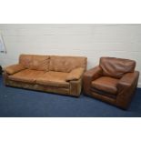 A TAN LEATHER THREE SEATER SETTEE, width 244cm and a similar brown leather armchair (sd) (2)