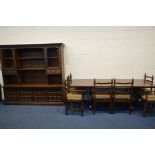 A YOUNGER OAK DINING SUITE, comprising an extending dining table with one additional leaf,